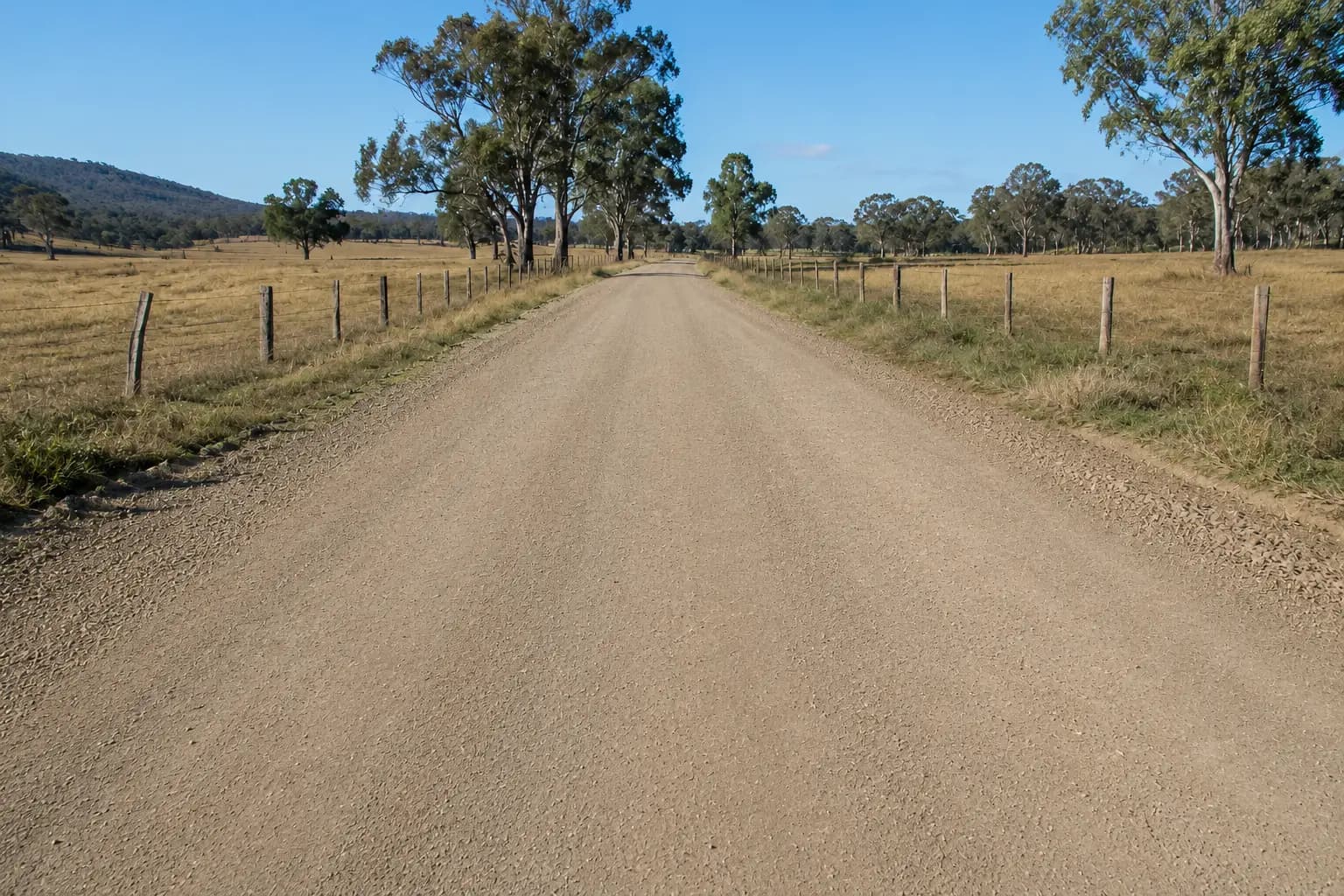 Close view of a freshly re-profiled gravel surface, crowned and tight